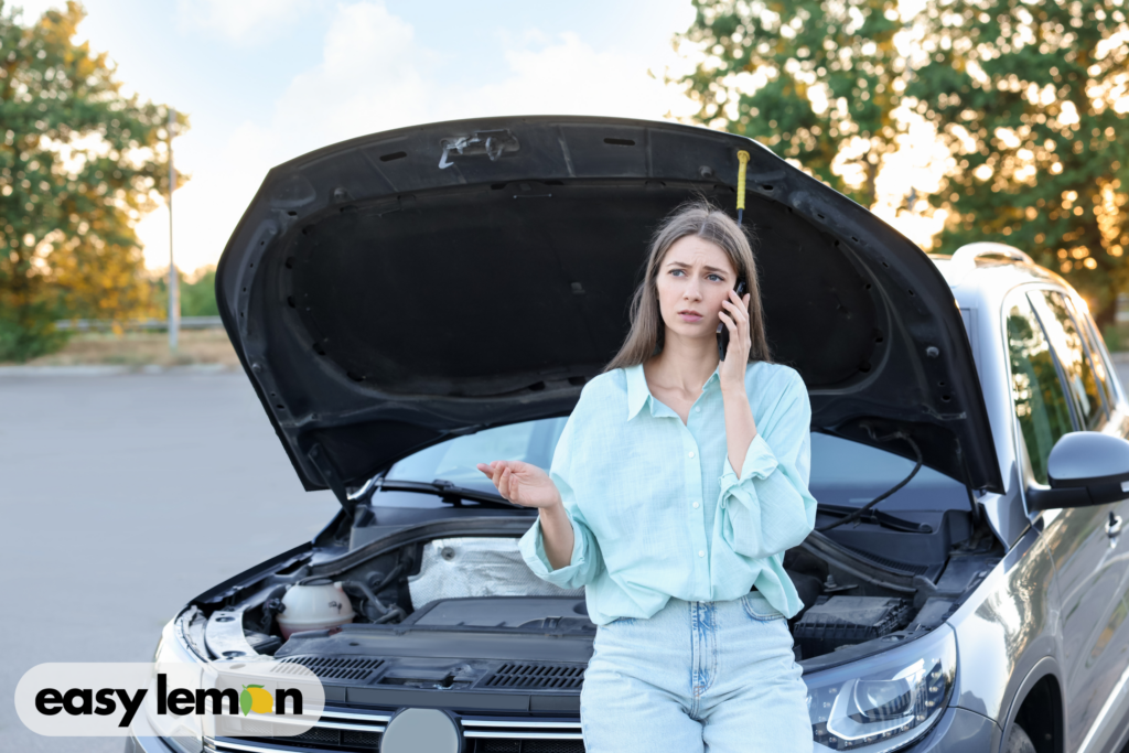 Stressed truck owner reviewing paperwork and calling for help with ram truck recall lemon law rights challenges.