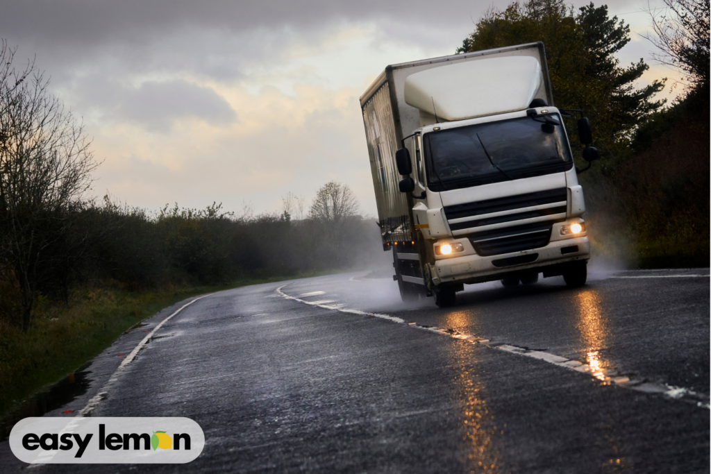 Mechanic inspecting Ram truck for issues related to the Ram electronic stability control recall