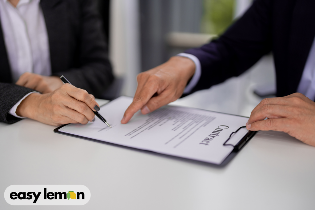 Attorney reviewing paperwork with a client during a Texas Ram Lemon Law claim.