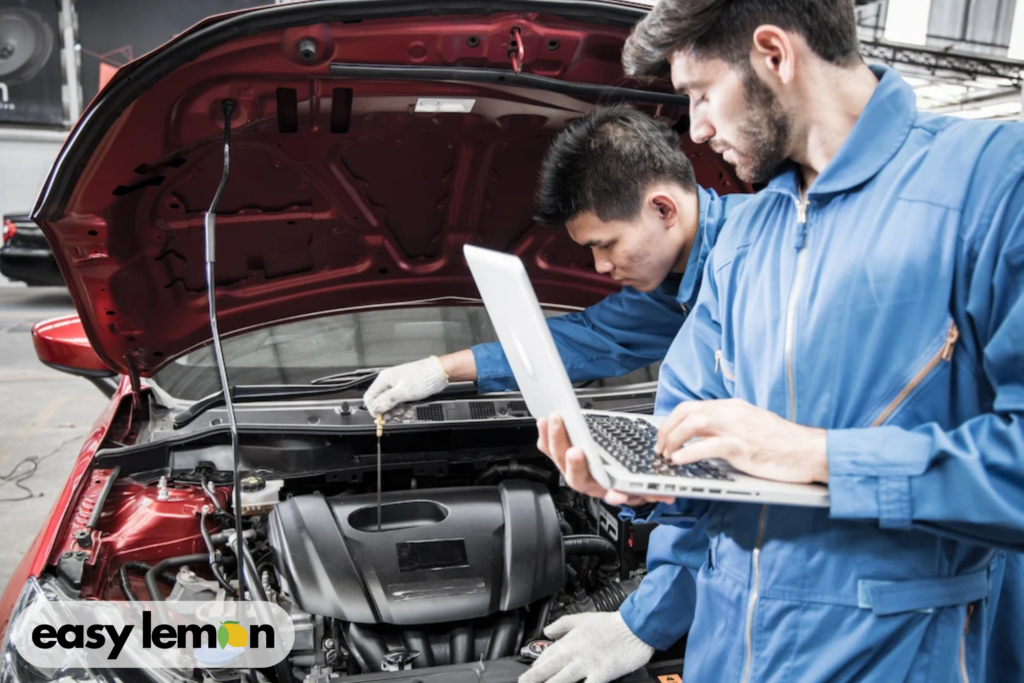 Mechanic inspecting vehicle for defects under Texas lemon law requirements
